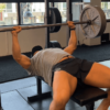 bench pressing 3 plates